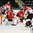 GRAND FORKS, NORTH DAKOTA - APRIL 21: Canada's David Quenneville #18 scores a first period goal against Switzerland's Philip Wuthrich #29 while Brett Howden #10, William Bitten #14, Simon le Coultre #4 and Fabian Berni #9 look on during quarterfinal round action at the 2016 IIHF Ice Hockey U18 World Championship. (Photo by Steve Poirier/HHOF-IIHF Images)

